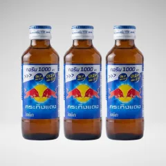 Phân phối 1 Chai Nước Tăng Lực Bò Húc REDBULL Chai Nắp Xanh