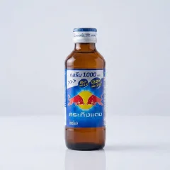 Phân phối 1 Chai Nước Tăng Lực Bò Húc REDBULL Chai Thủy Tinh Nắp Xanh