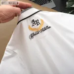 Áo thun nam cổ bẻ thêu sau lưng