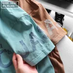 Áo thun nam cổ tròn in chữ thun cotton wash nhẹ