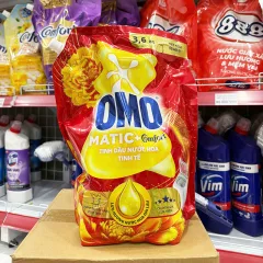 Nước Giặt OMO Matic Cửa Trên Hương Tinh Dầu Nước Hoa Tinh Tế 3.6kg