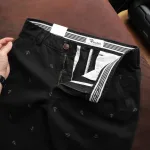 Quần Short Kaki Nam Cao Cấp In Logo Mũi Neo