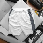 Quần Short Thun Nam Phối Sọc Màu Túi Kéo