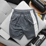 Quần Short Thun Nam Phối Sọc Màu Túi Kéo