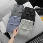Quần Short Thun Nam Viền Sọc Ngang New Basic