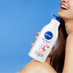 Phân phối sữa Dưỡng Thể Nivea Dưỡng Da Sáng Mịn 350ml Màu Hồng - Ban Ngày