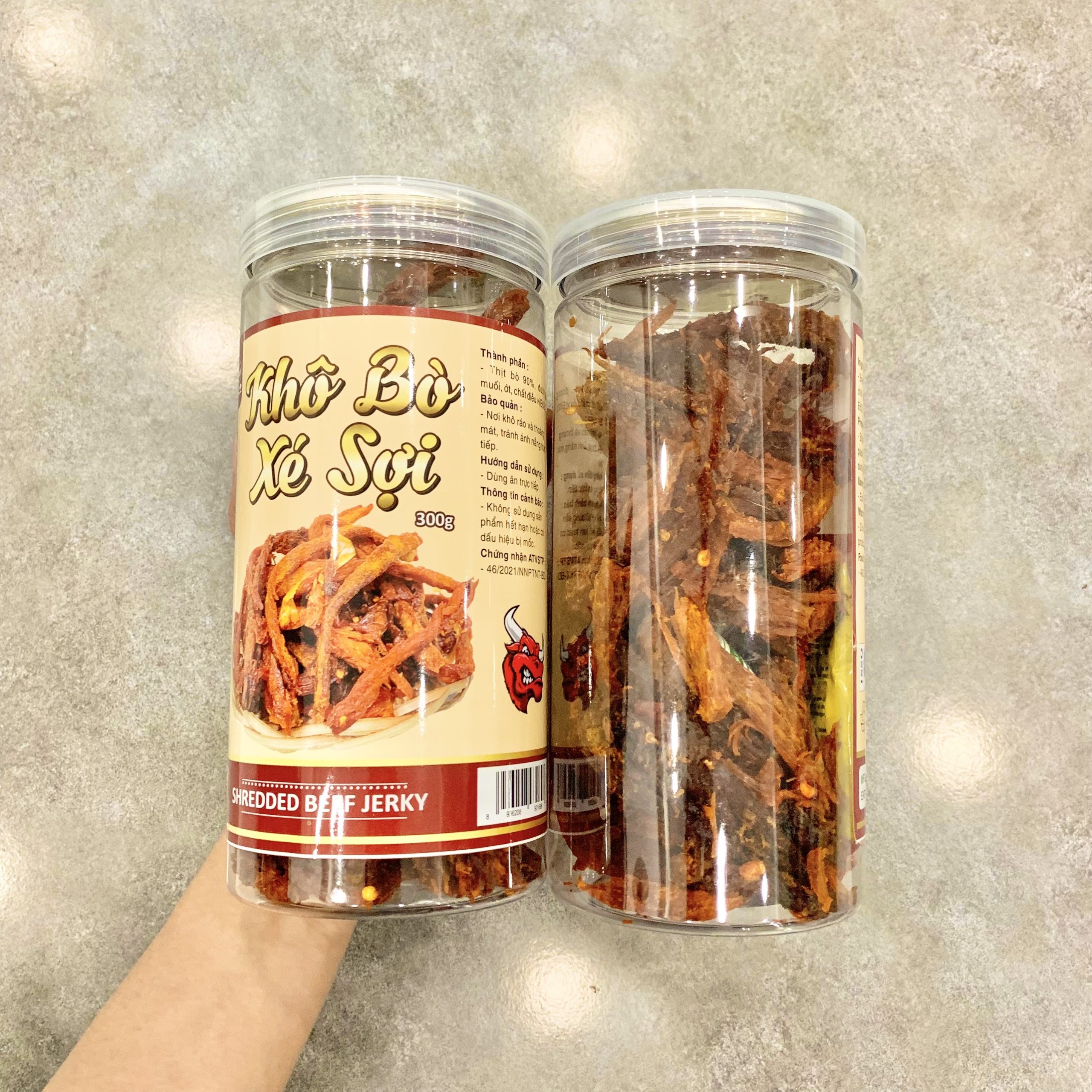 22517-2355382462-z4842093035108-1cc623f05618b32b50864d47a803b846-3.jpg Khô Bò Xé Sợi Loại Ngon 300g hộp - KBXS