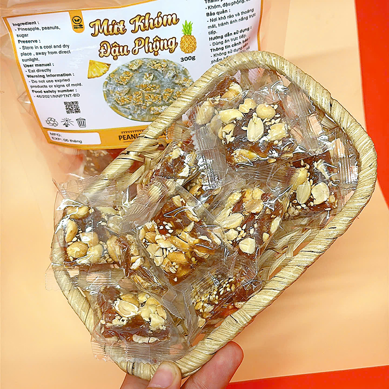 23380_z6125808228071-73f5cdb8e9ce1400dec4446072cd9b79_20241214103020-1.jpg Mứt Khóm Đậu Phộng Túi Zip 300g - MKDPTZ
