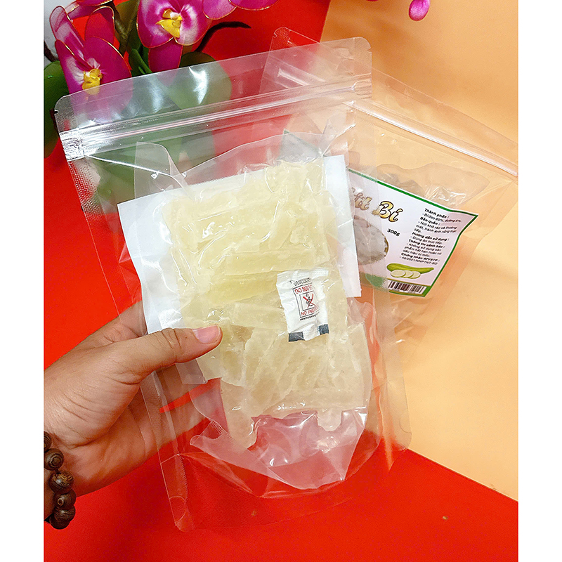 23382_z6125806628618-6dcf279cf4976a1292267cdc930f6233_20241213154726-1.jpg Mứt Bí Túi Zip 300g - MBHCK