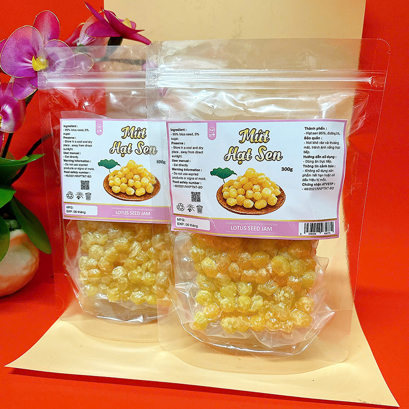 23384_z6125810971880-cb282023eb96f8b0e29061566cd68b8f_20241213165015-3.jpg Mứt Hạt Sen Túi Zip 300g - HSHCK