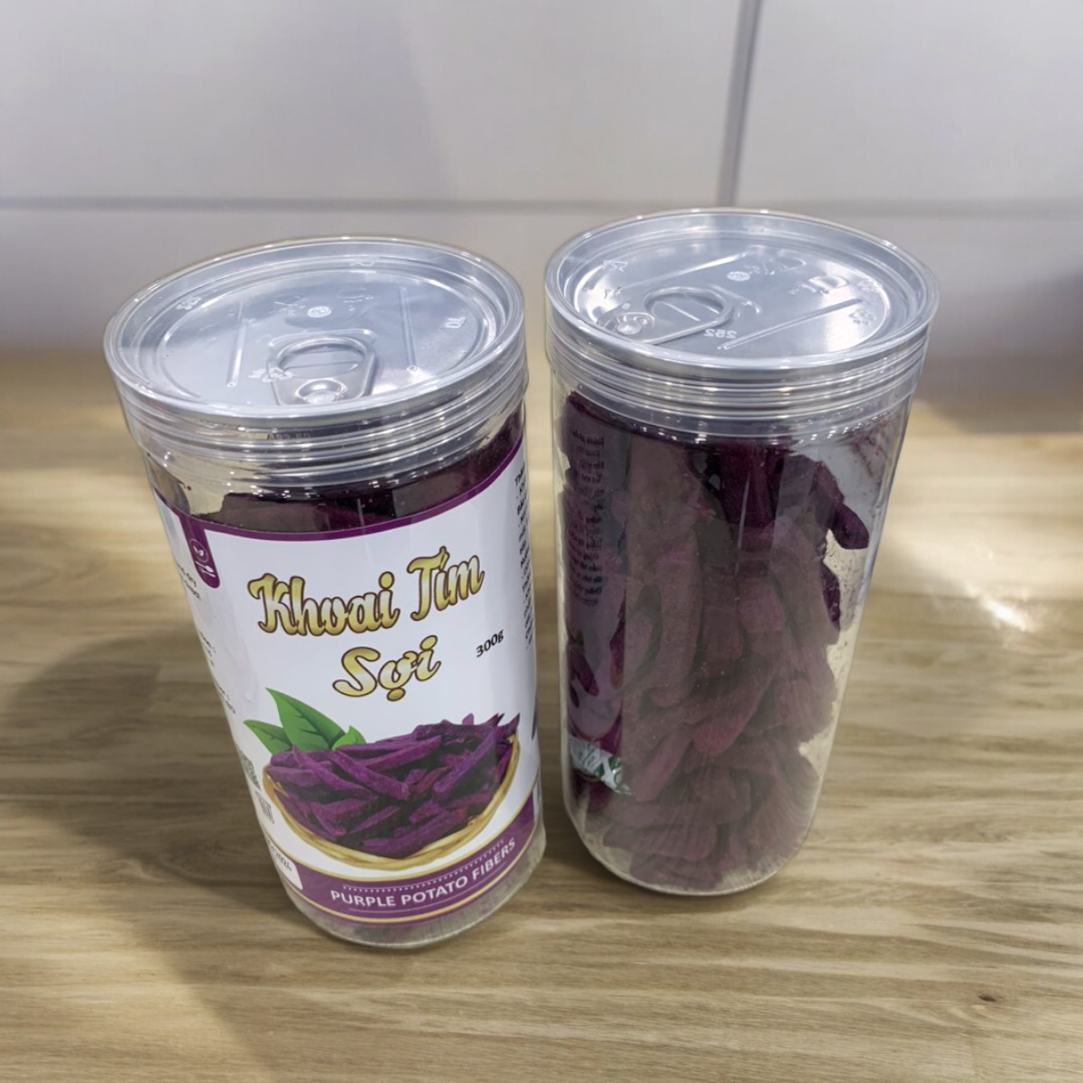 24447_z5494823921859-45144835de149fe9819502ee69c6f75f-photoroom_20240601141727-5.png Khoai Lang Tím Sợi Cộng Giòn 300g - 8936208930912