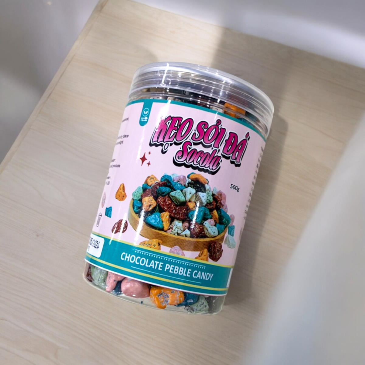 24452_z5494824448319-e623c5d2f337074bf7e199258538a17e-photoroom_20240601150023-1.png Kẹo Socola Sỏi Đá 500g - 8936208930424
